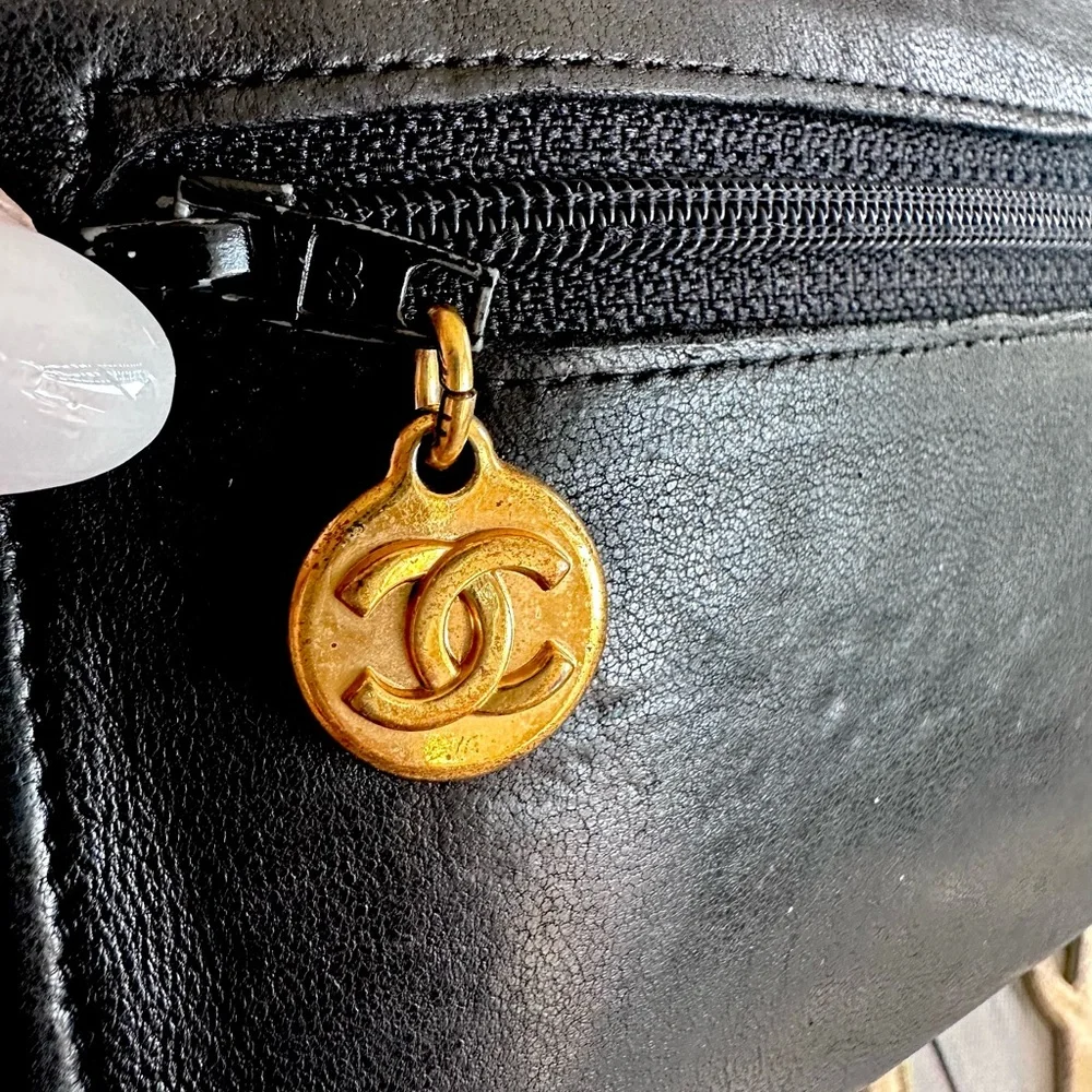 CHANEL Black and Gold Clutch with Iconic Design - Picture 3 of 10